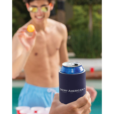 Young man playing beer pong with a Very American® Drink Cooler in the photo.