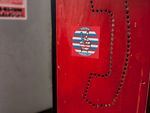 Logo sticker on a phone booth.